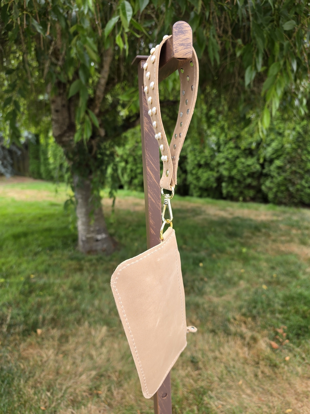 Stud-Accent Leather Wristlet Pouch in Beige